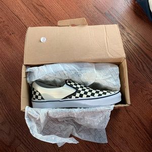 Classic black & white checkered slip on Vans
